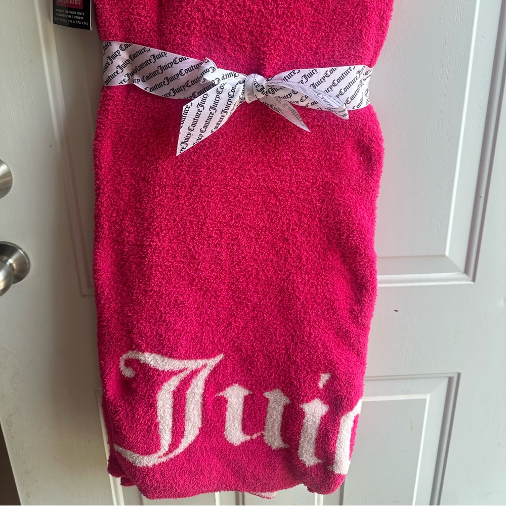 Juicy Couture hot pink reversible throw